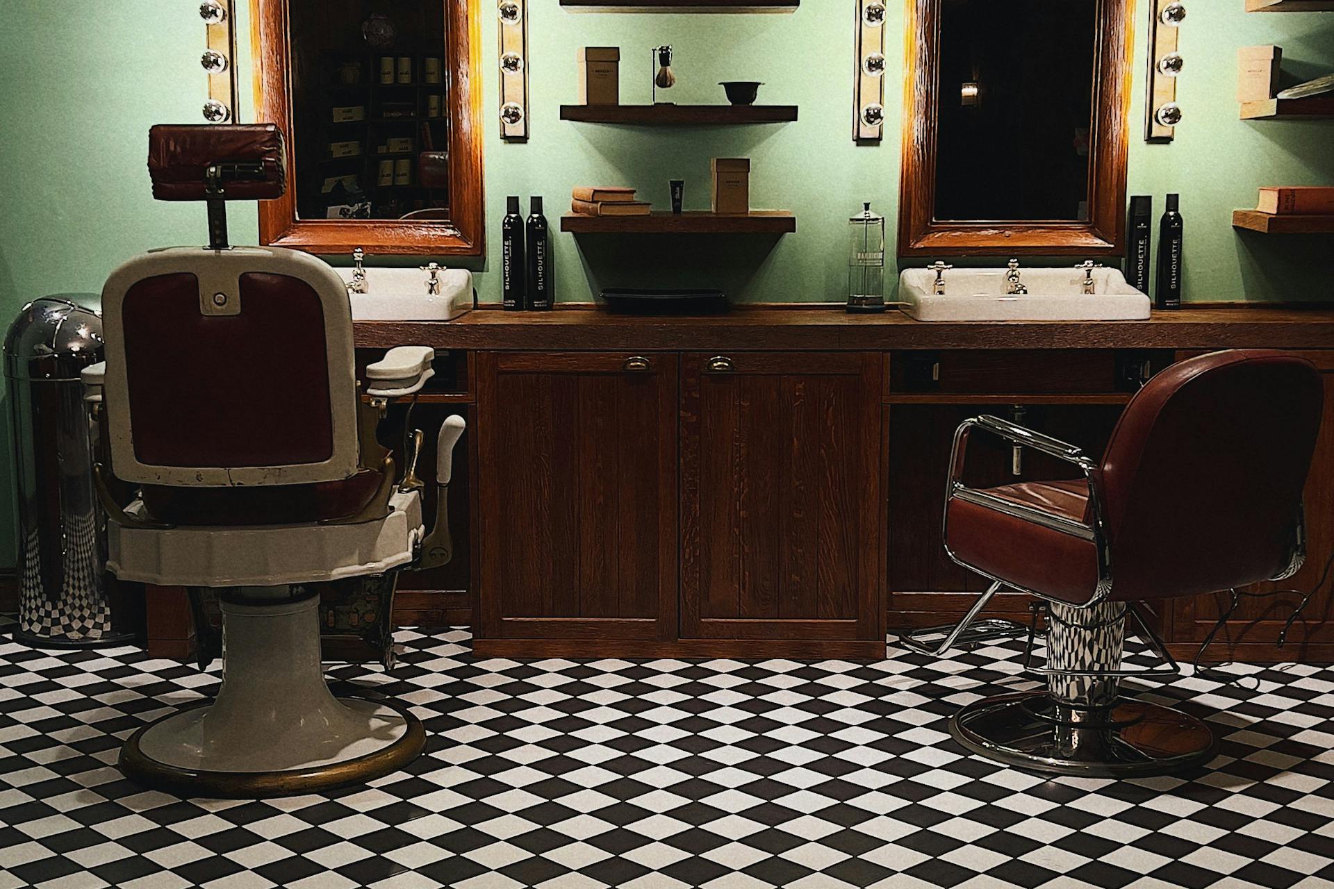 Polished barber chair, Williamsburg loft lighting, copper and brick